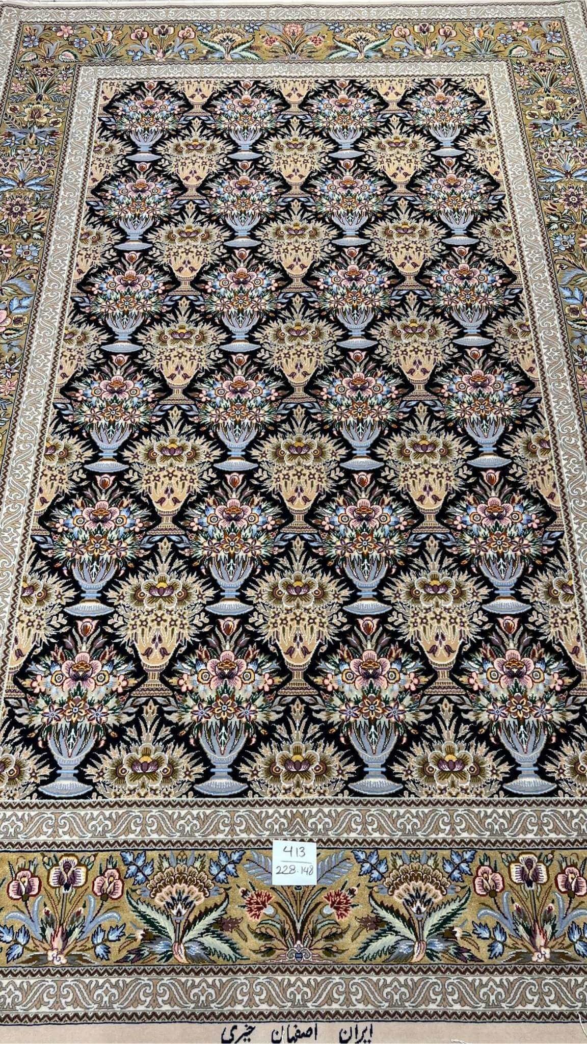 "Iranian handmade carpet with Persian knot and detailed design"